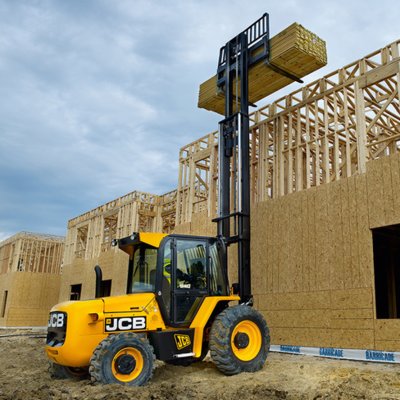 Forklift unloading machinery and industrial equipment in Sutton